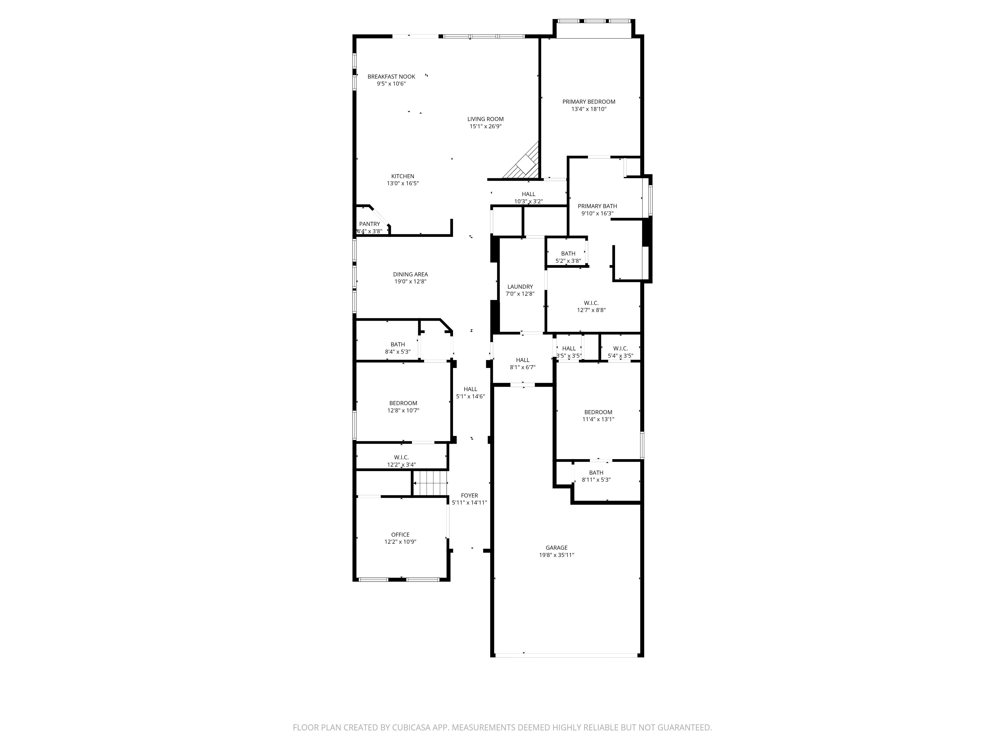 First floor plan showing living areas, kitchen, primary suite, and garage