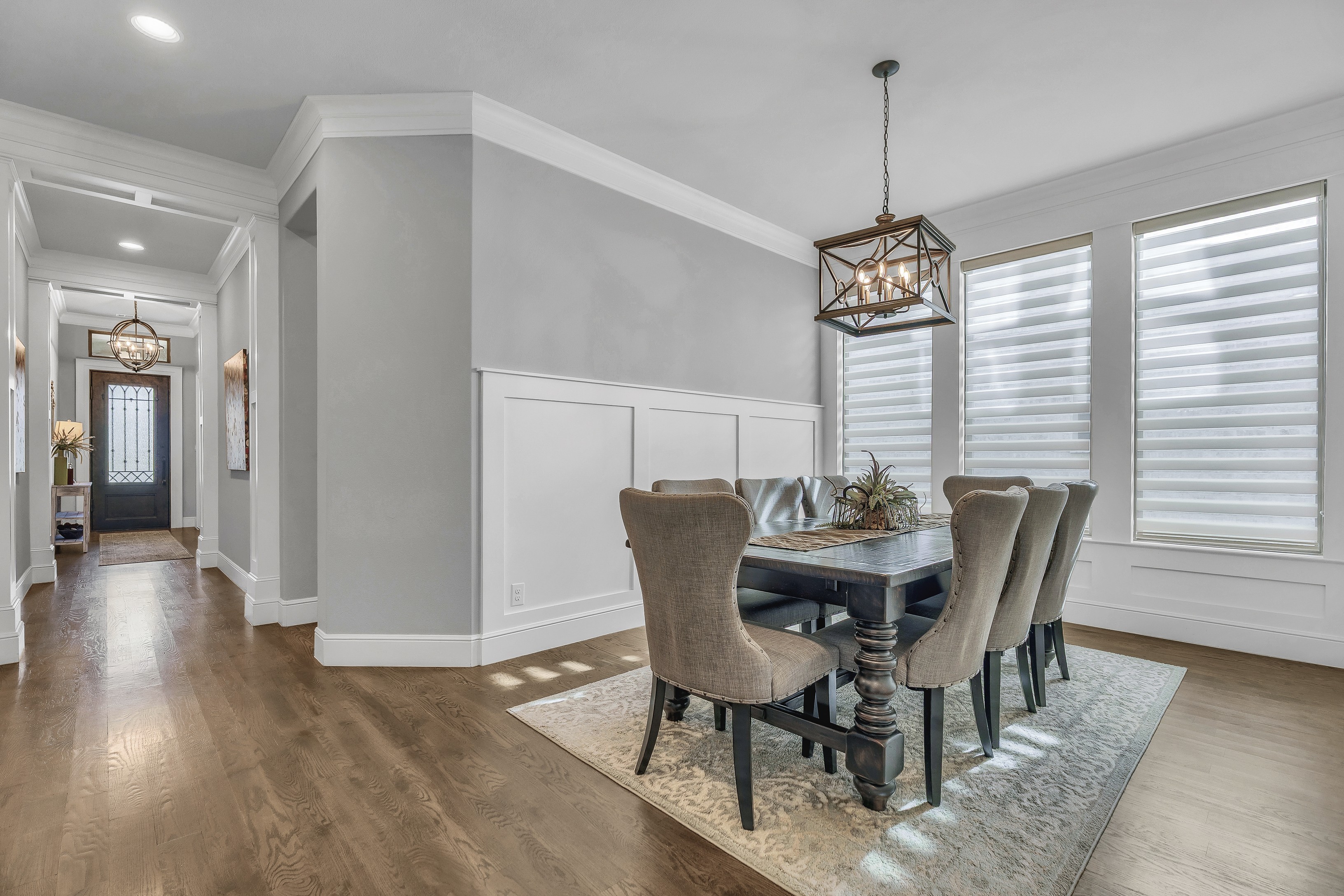 Formal dining room with designer lighting