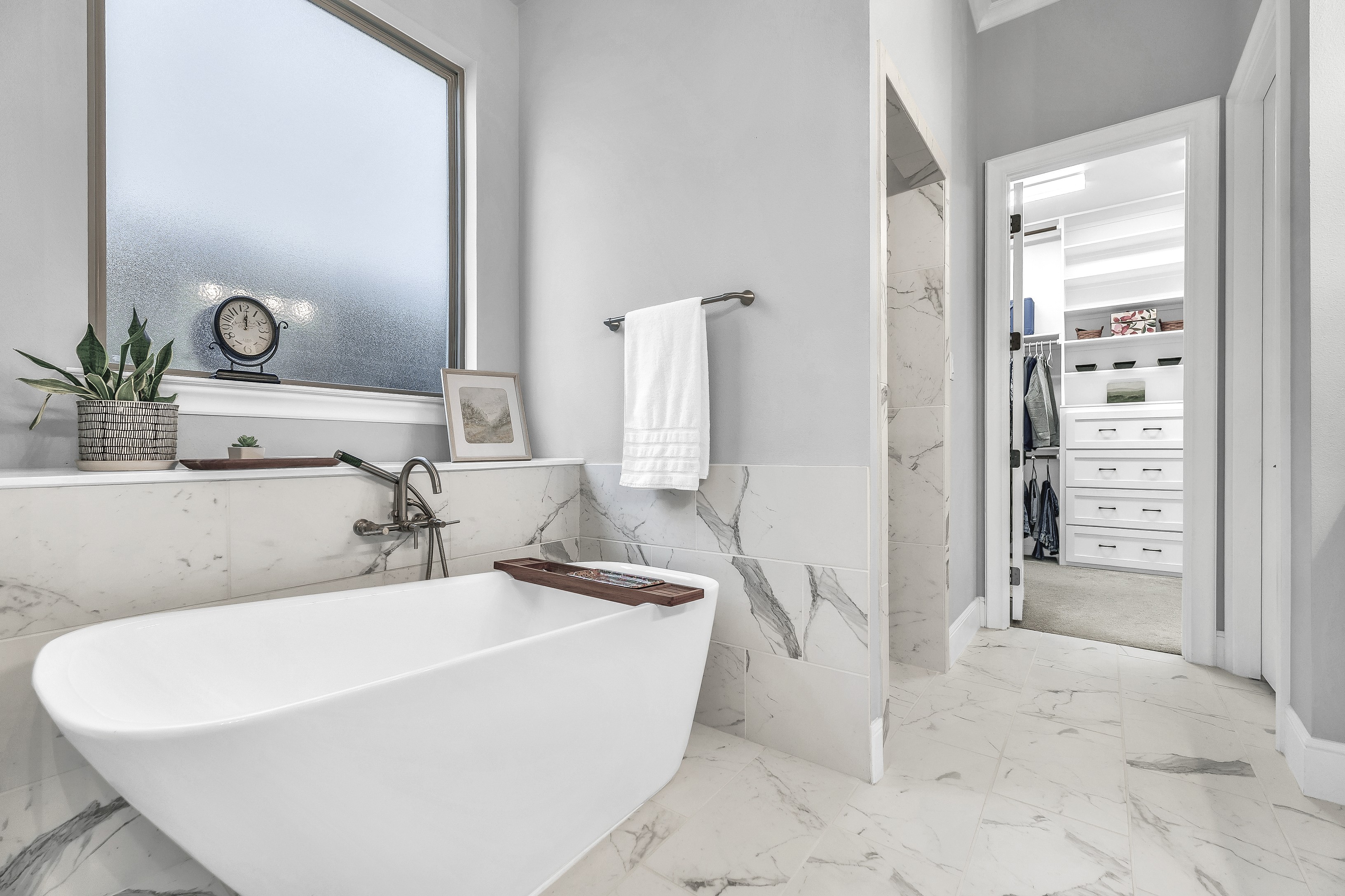Primary bathroom with soaking tub and walk-in shower