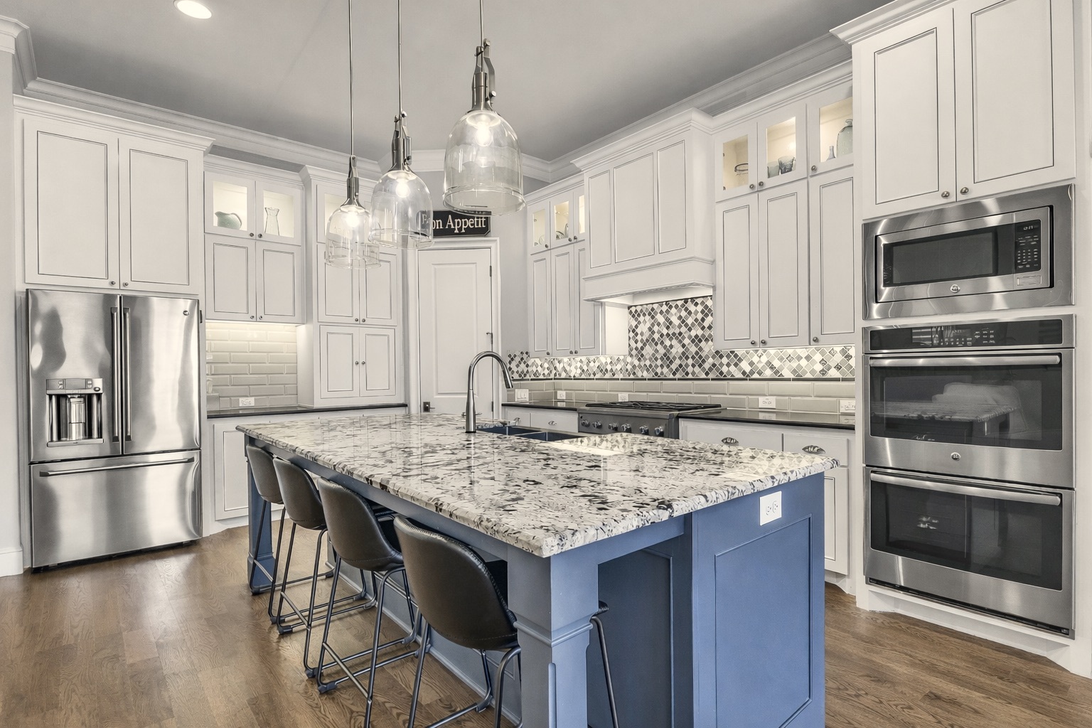 Gourmet kitchen with premium appliances and custom cabinetry